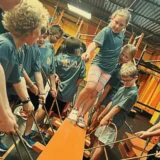 Kids participating in a balance and coordination challenge during one of Mission Grit's no school day camps Charlotte NC.